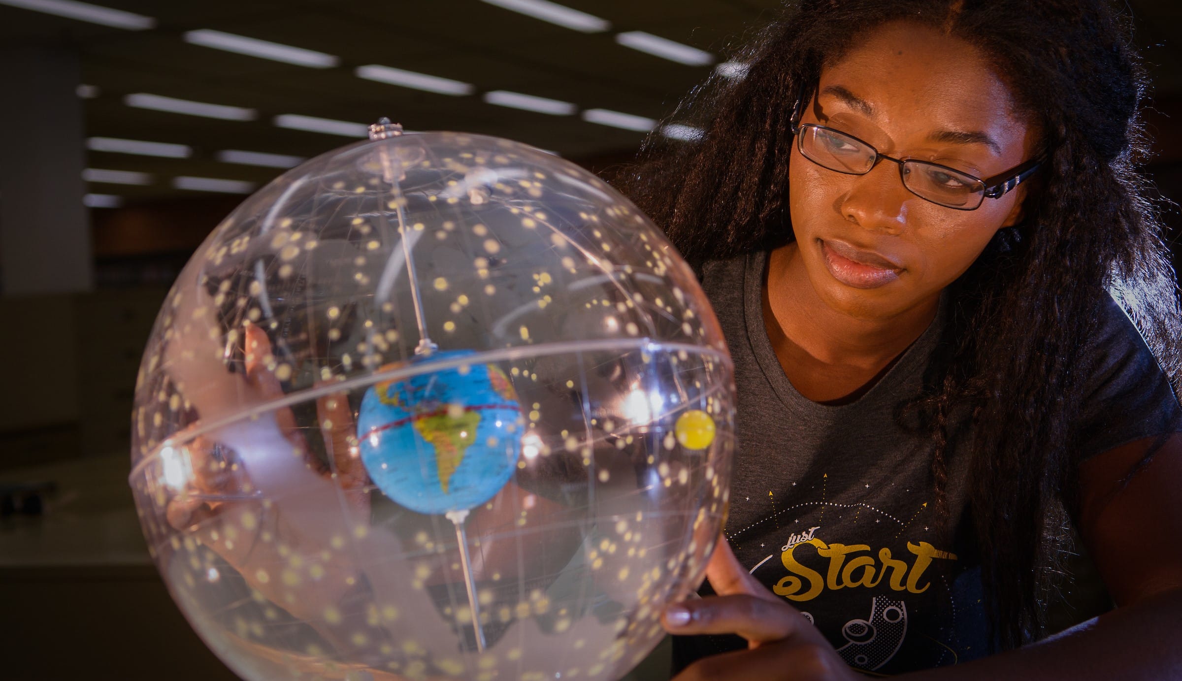 Student studying the solar system