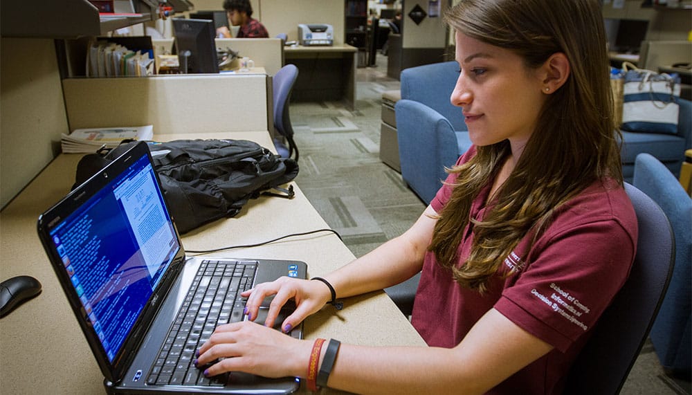 Student working on a laptop