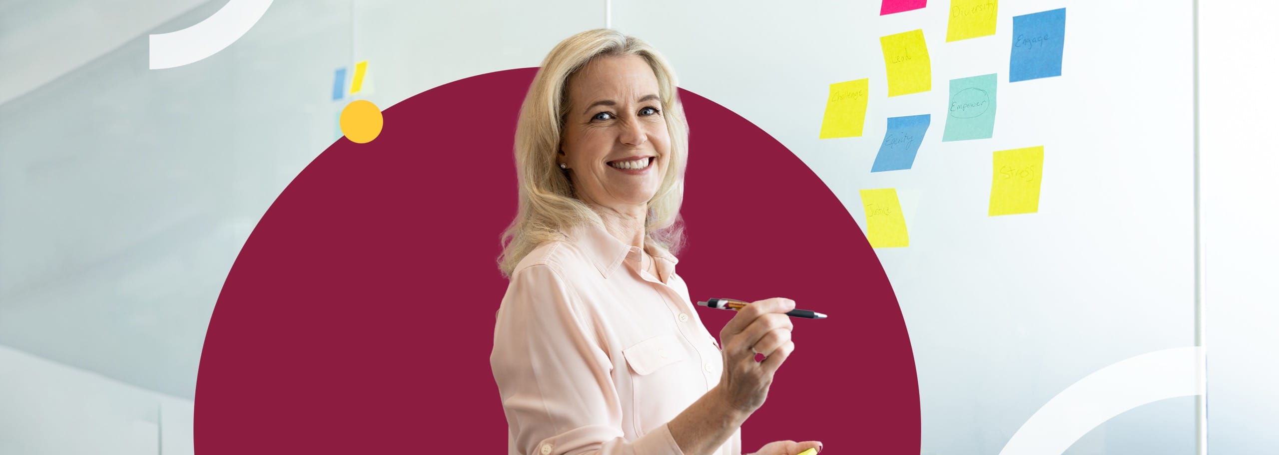 Woman standing at white board