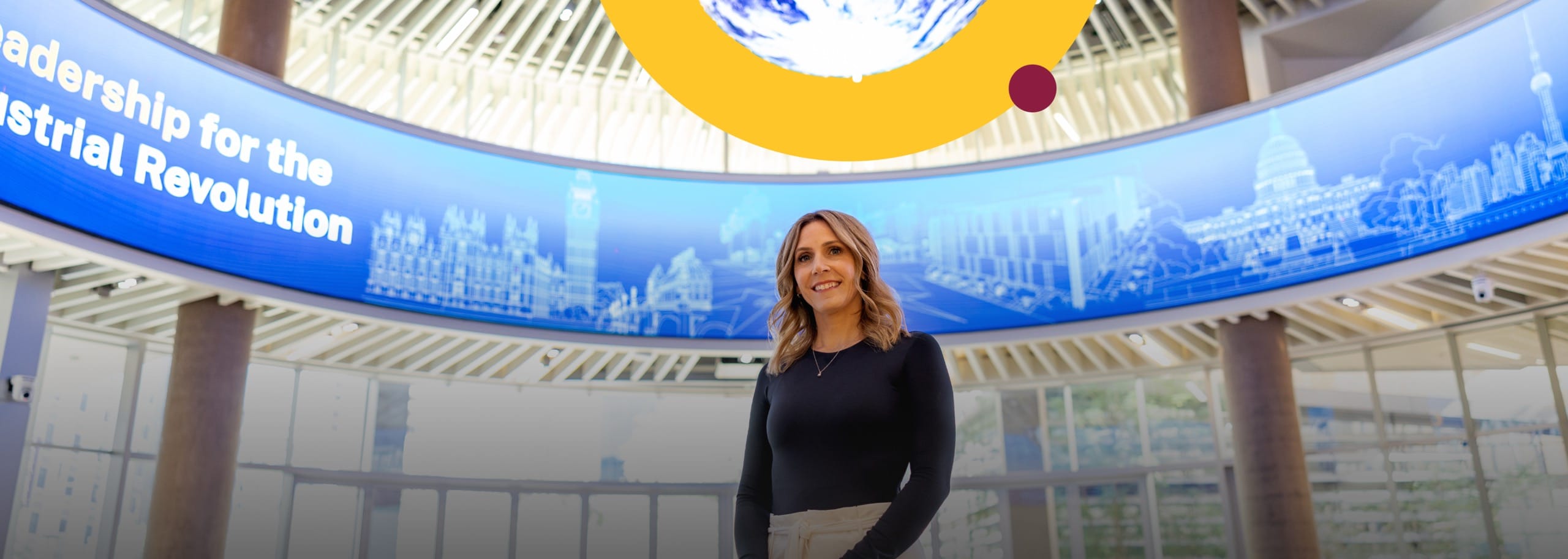 Woman standing in a lobby